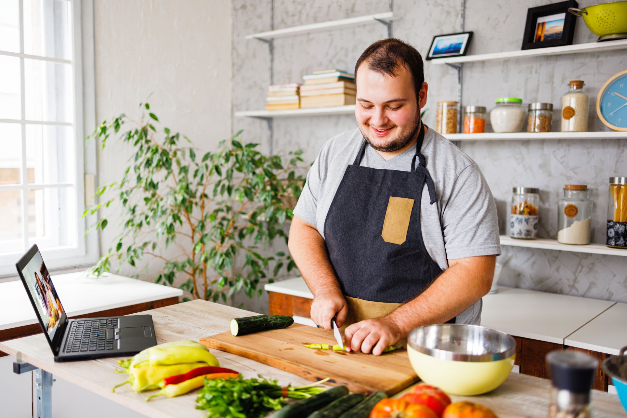 Man Cooking In Kitchen